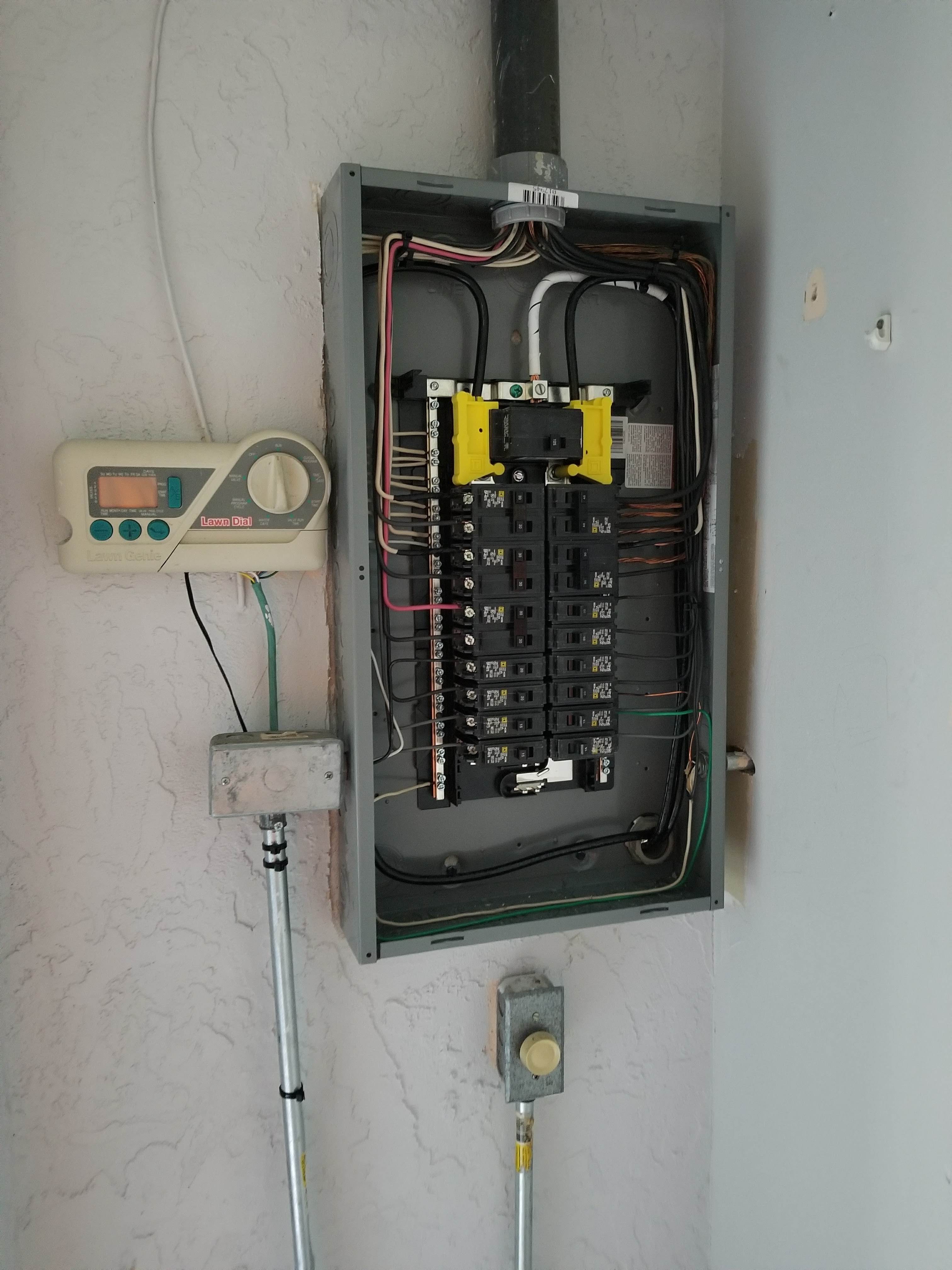 Upgraded electrical panel checked with a clamp meter in Tampa Bay