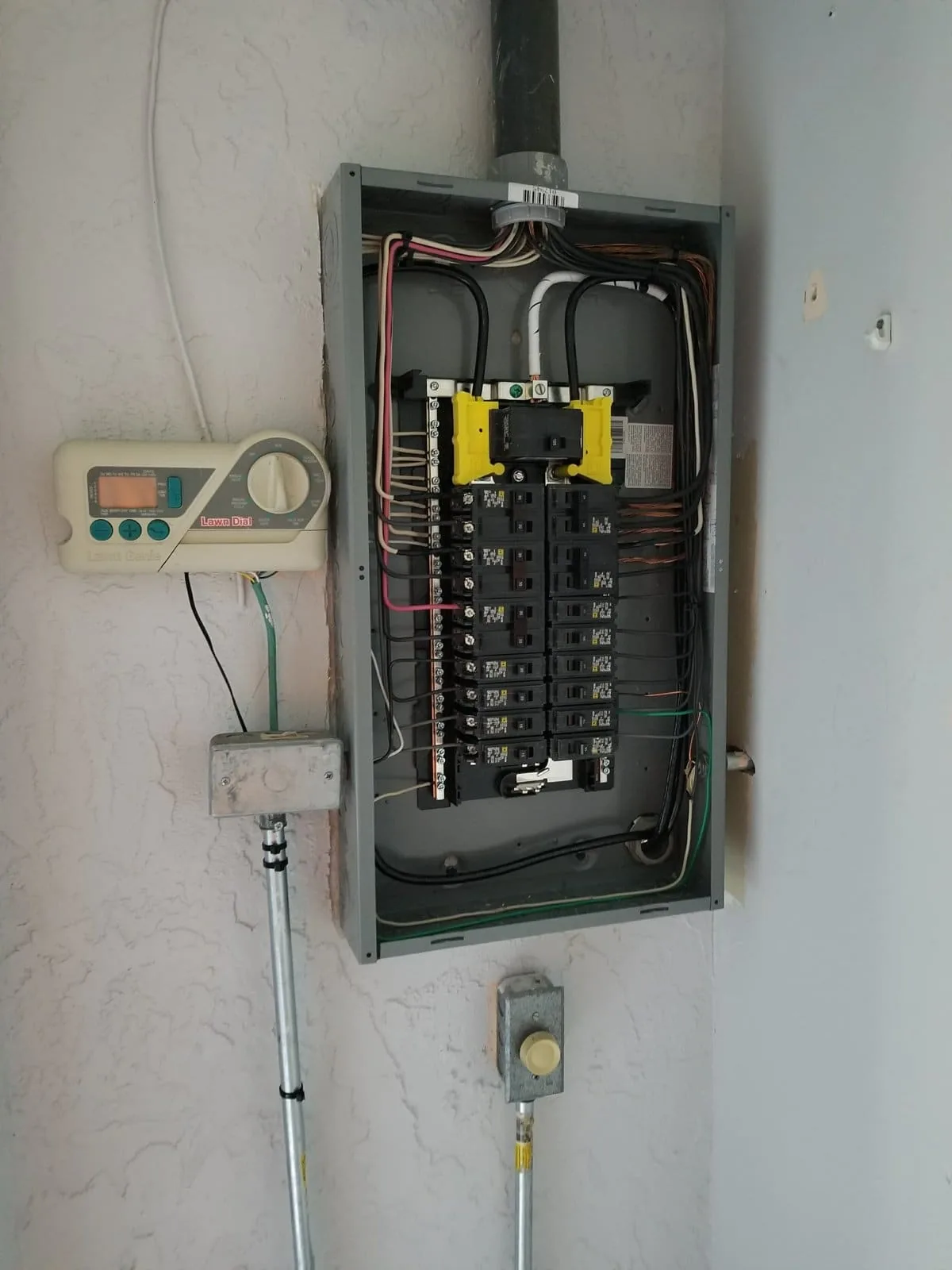 Upgraded electrical panel checked with a clamp meter in Tampa Bay