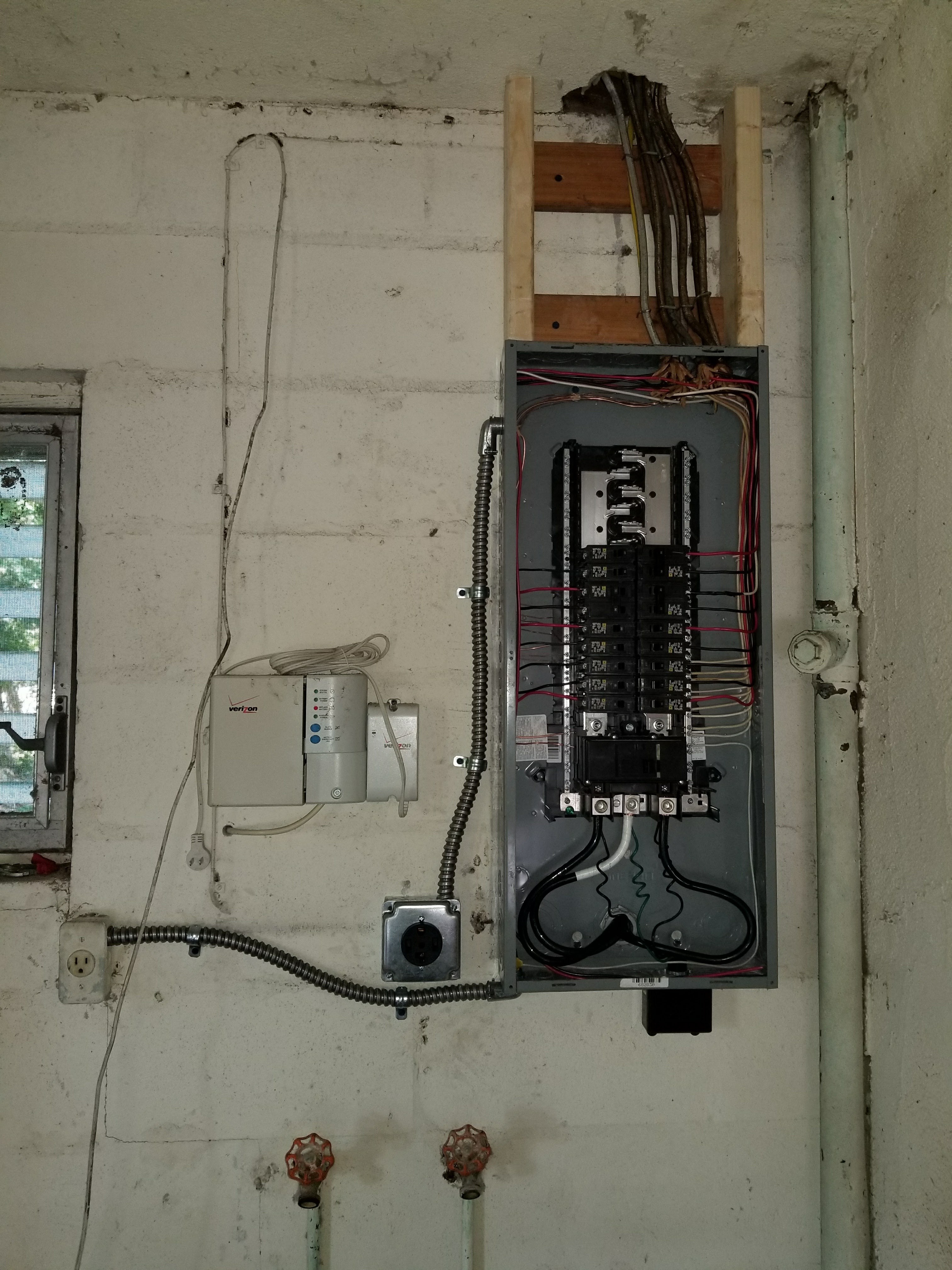 Electrical panel with whole-home surge protector after a Tampa Bay upgrade