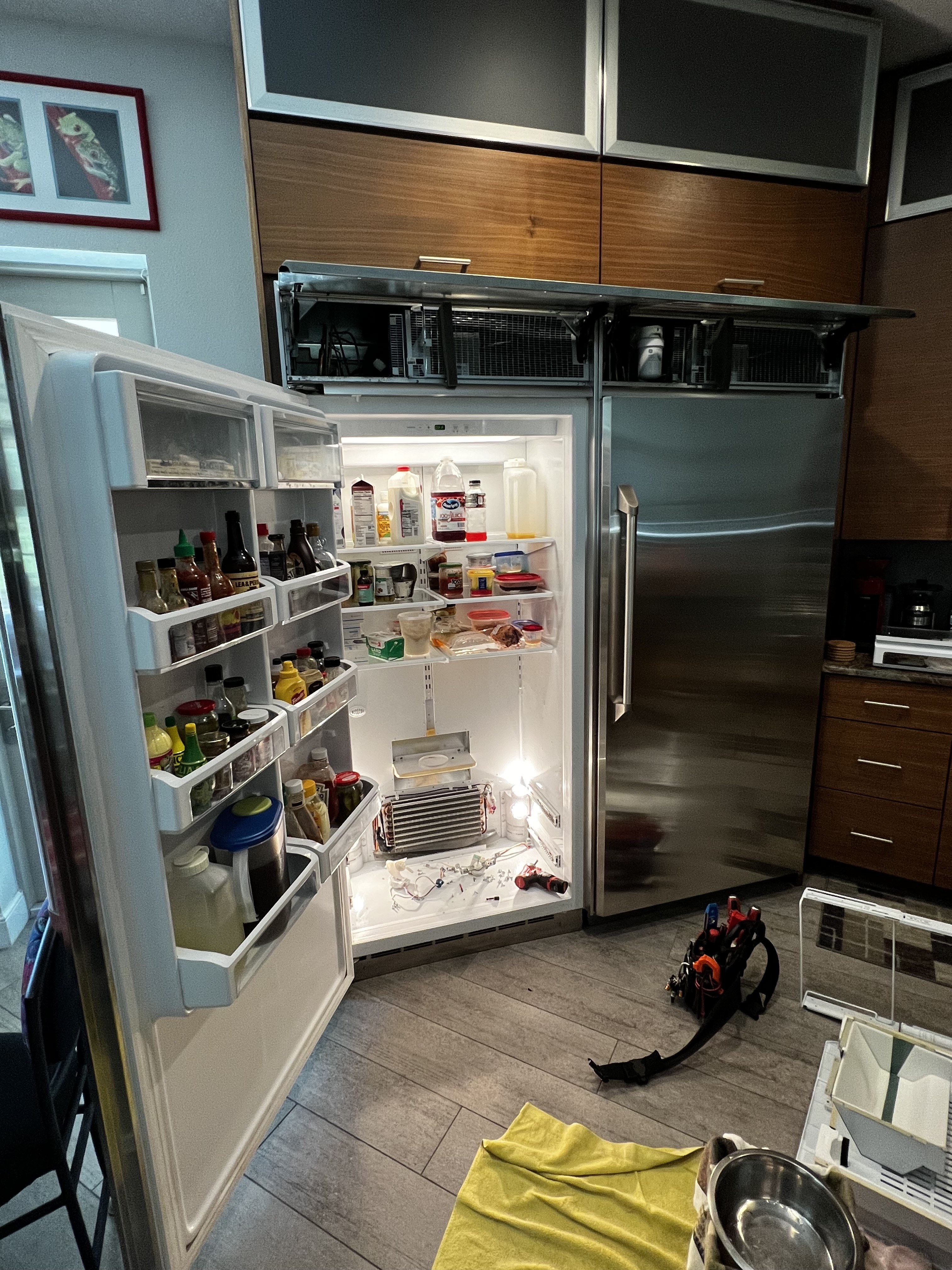GE Monogram built-in refrigerator open during service call — New Port Richey appliance repair