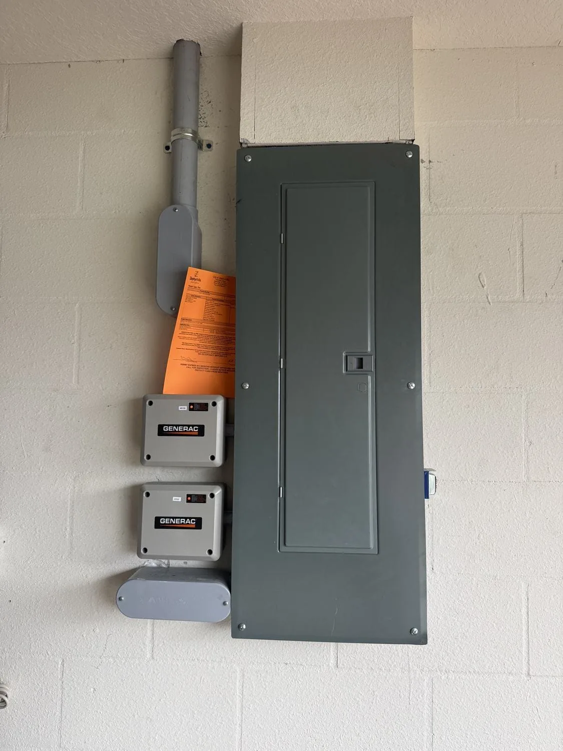 County permit tag posted at the transfer switch awaiting inspection in Tampa Bay
