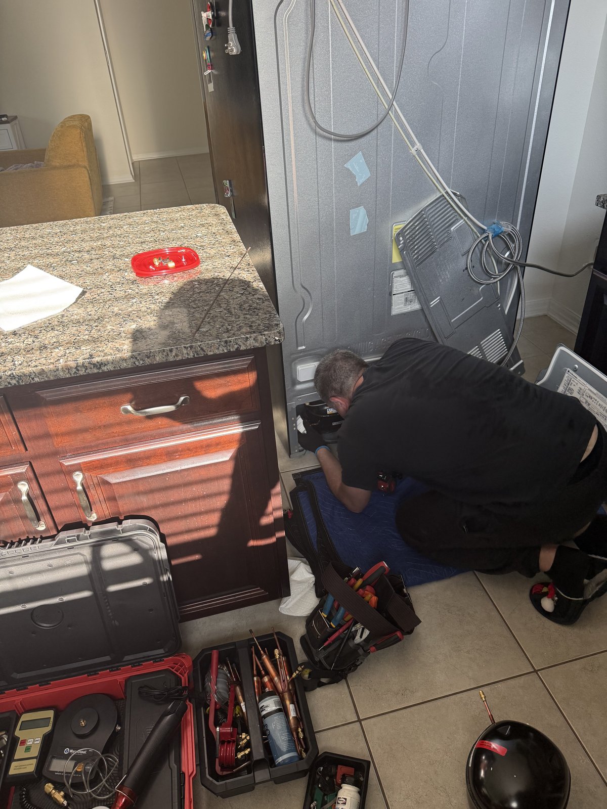 LG appliance repair — technician servicing dishwasher on-site — Tampa Bay
