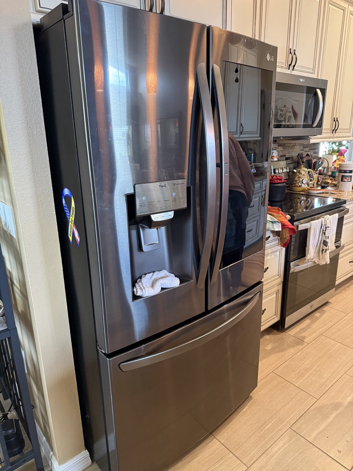 LG black stainless French-door refrigerator in a New Port Richey kitchen