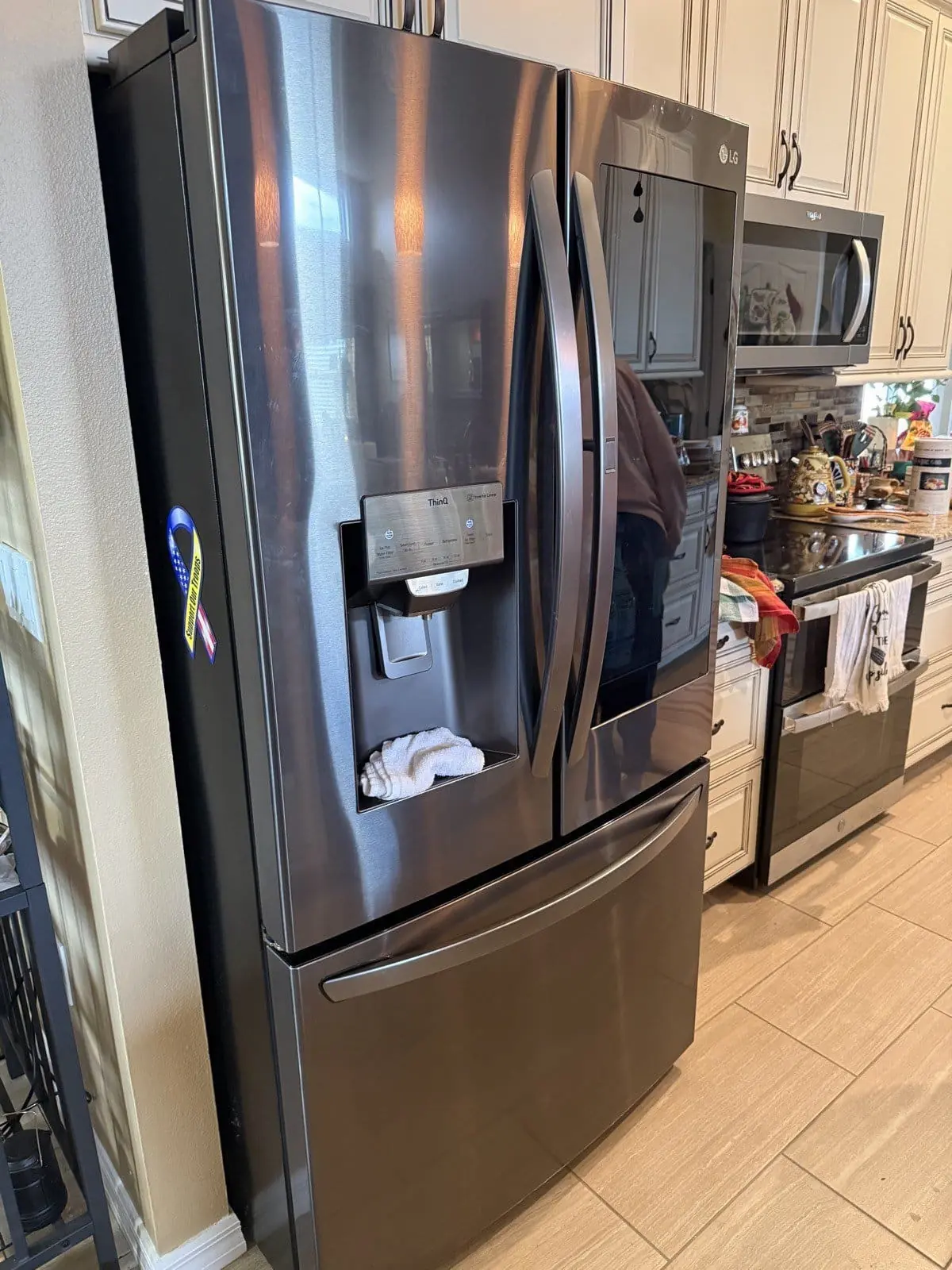LG black stainless French-door refrigerator in a New Port Richey kitchen