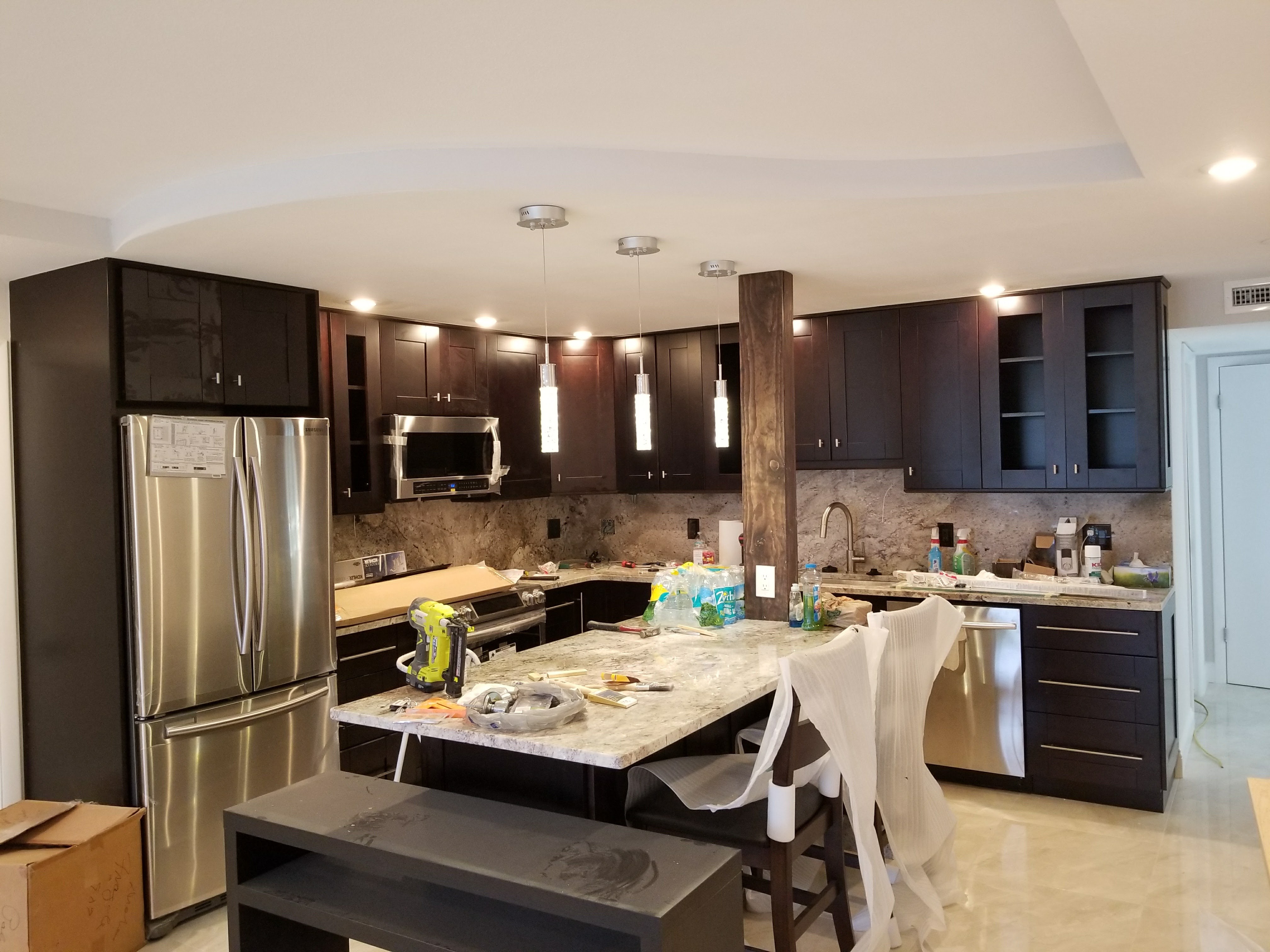 Kitchen recessed lighting and pendant lights installed by Fixer Service in Tampa Bay