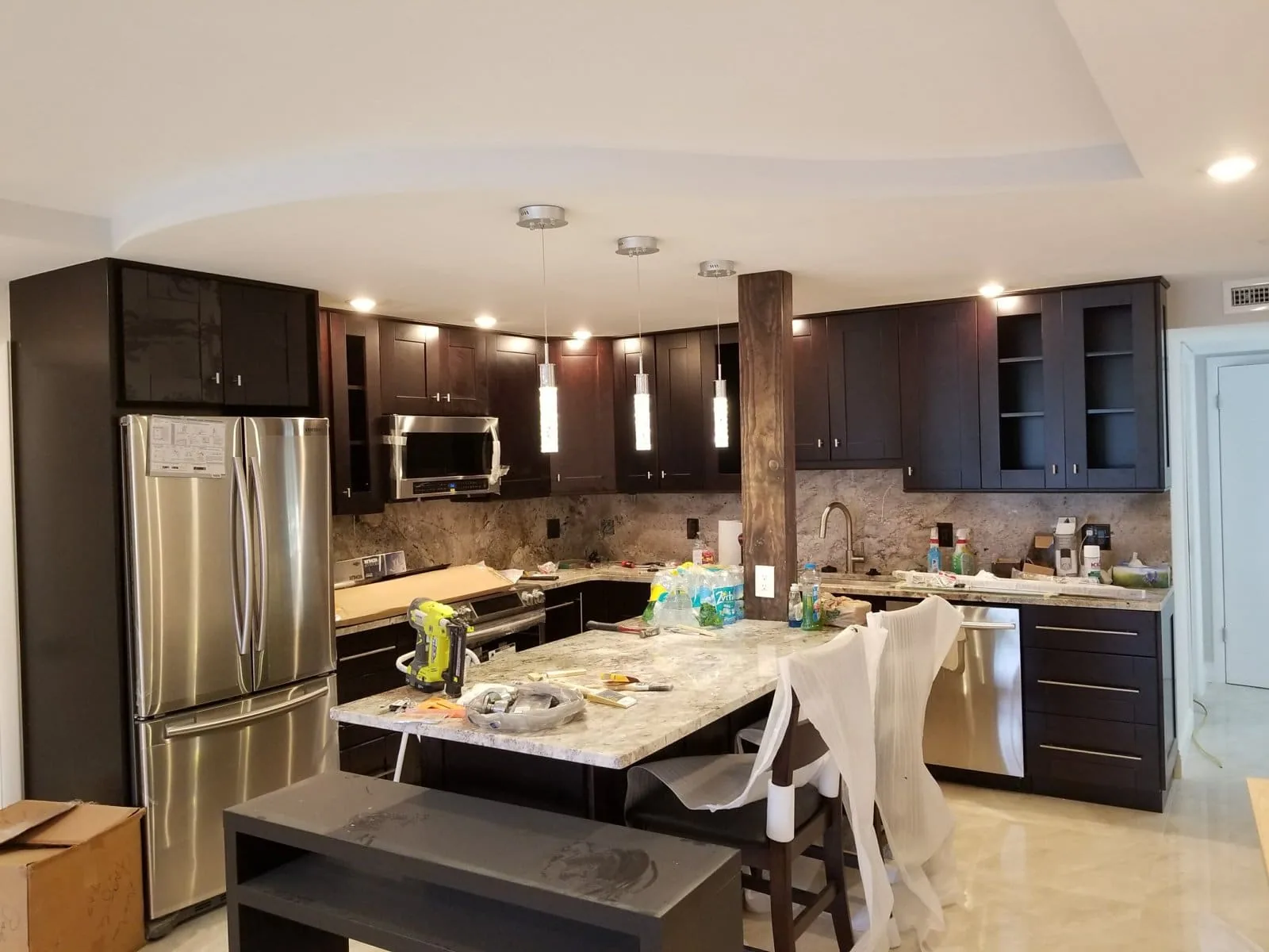 Kitchen recessed lighting and pendant lights installed by Fixer Service in Tampa Bay