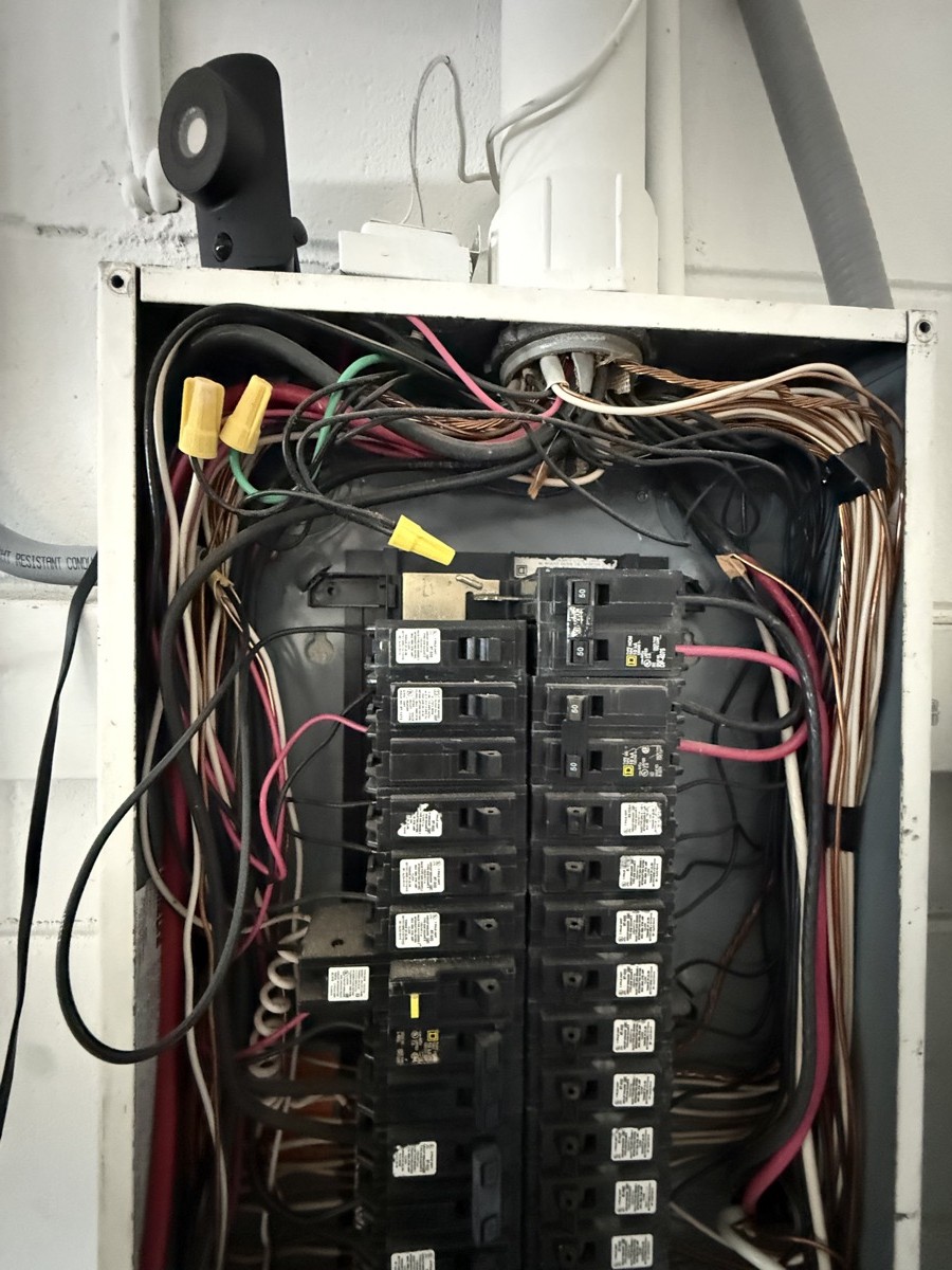 Outdated electrical panel flagged for replacement in a Tampa Bay home