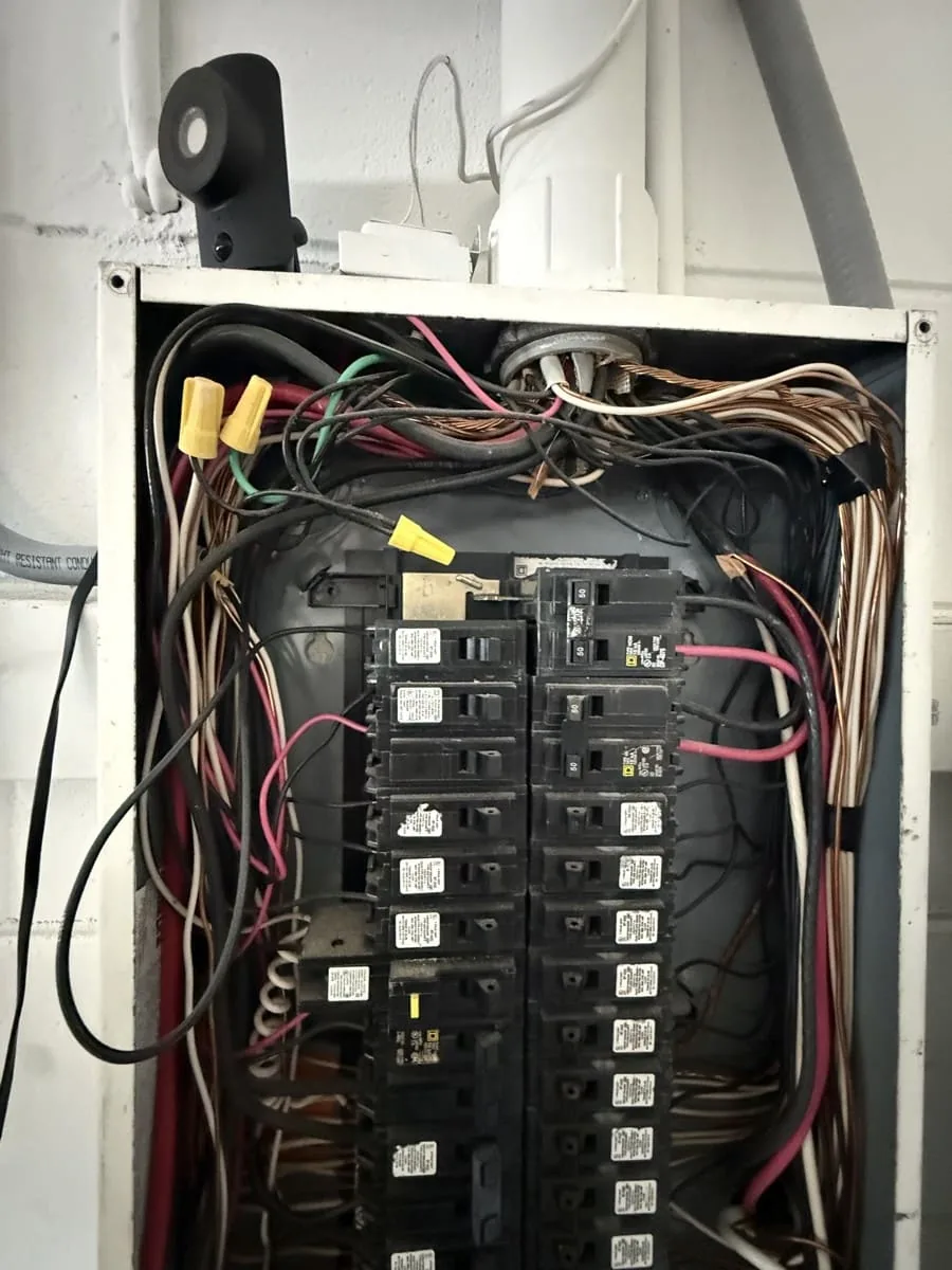 Outdated electrical panel flagged for replacement in a Tampa Bay home