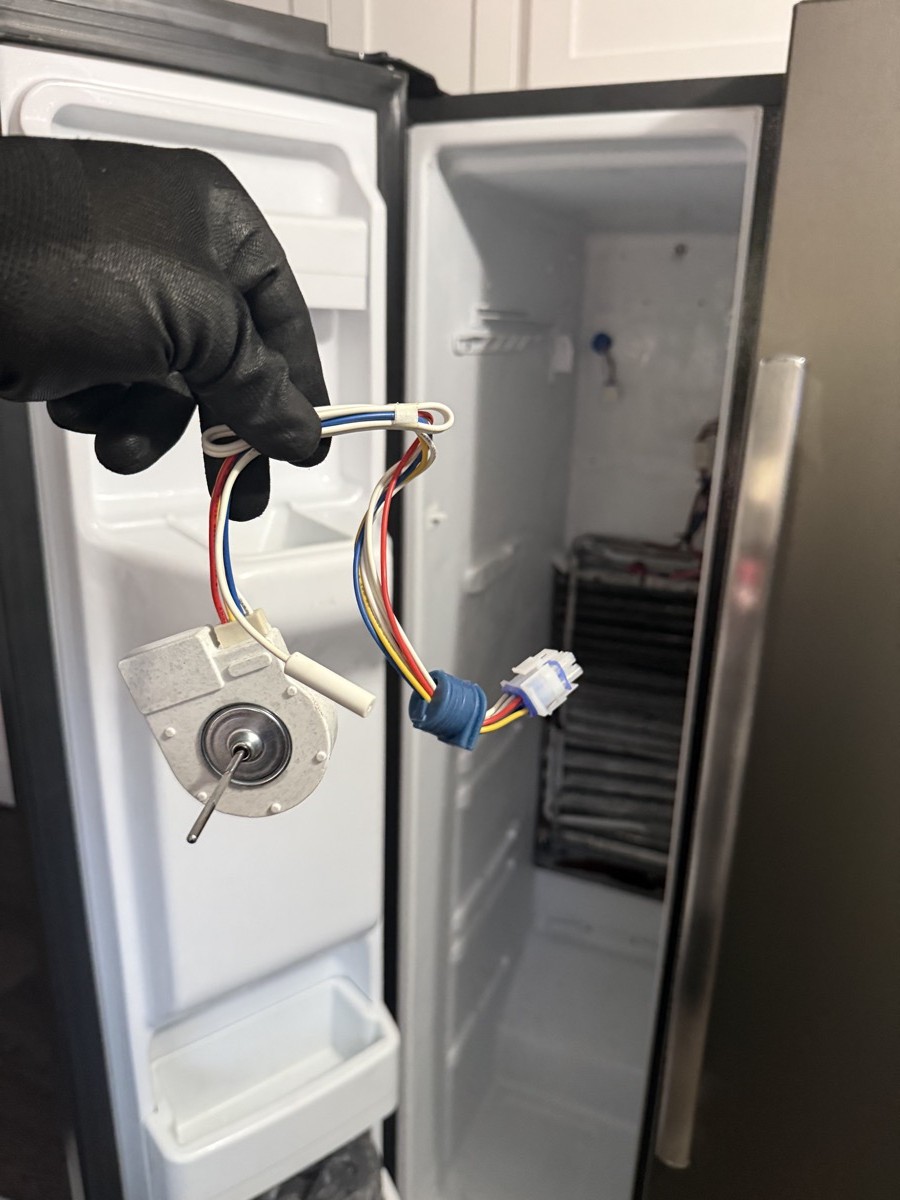 Evaporator fan motor removed from Samsung refrigerator freezer — Tampa Bay appliance repair