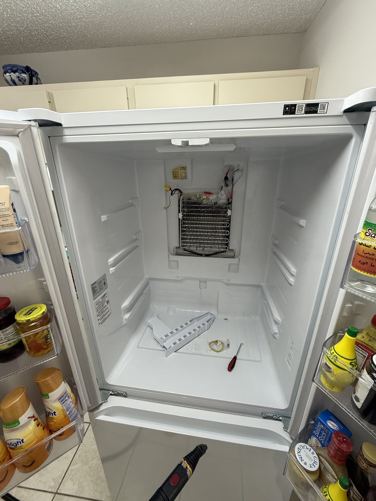 Samsung refrigerator freezer evaporator repair — Tampa Bay