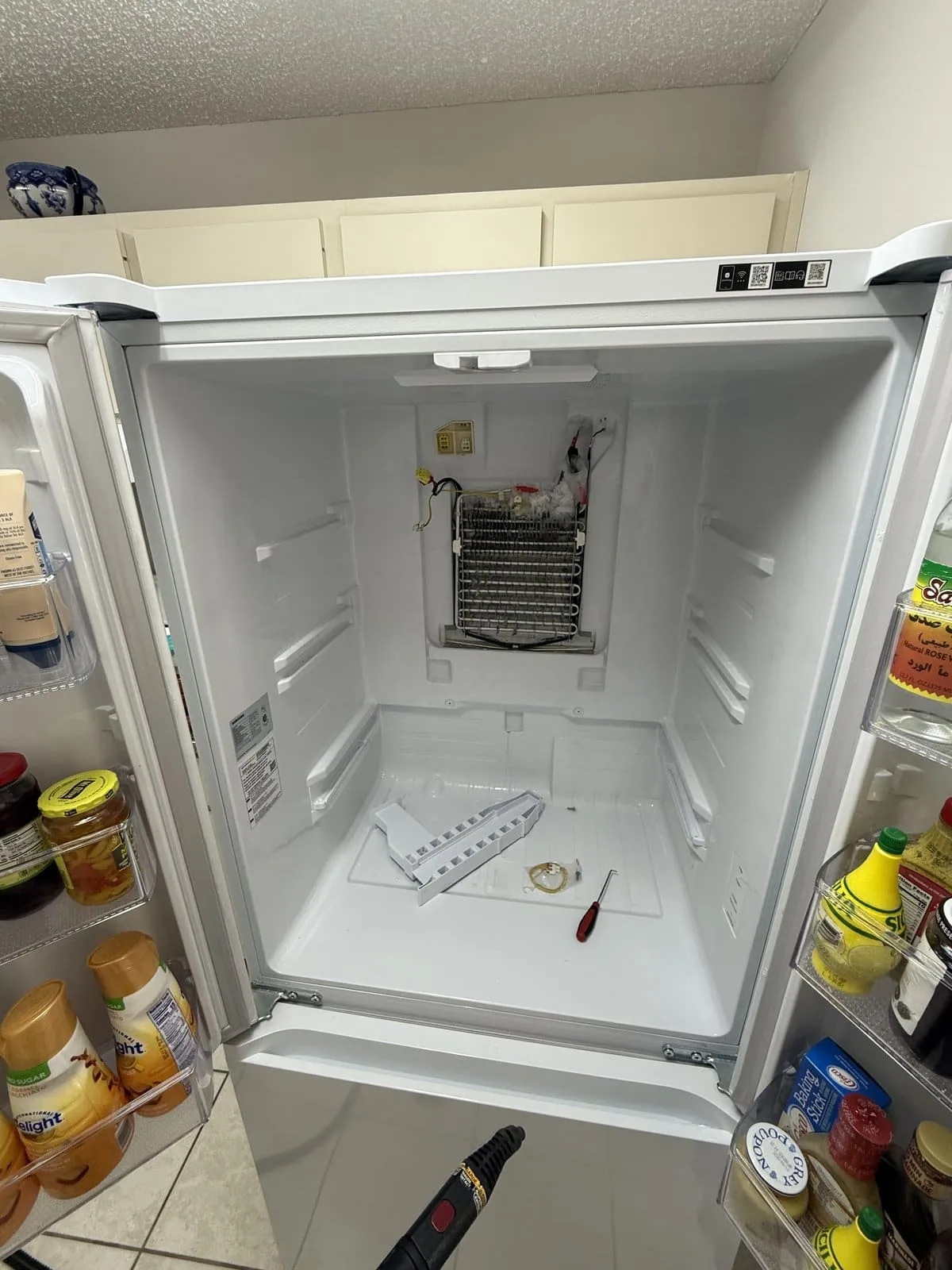 Samsung refrigerator freezer evaporator repair — Tampa Bay