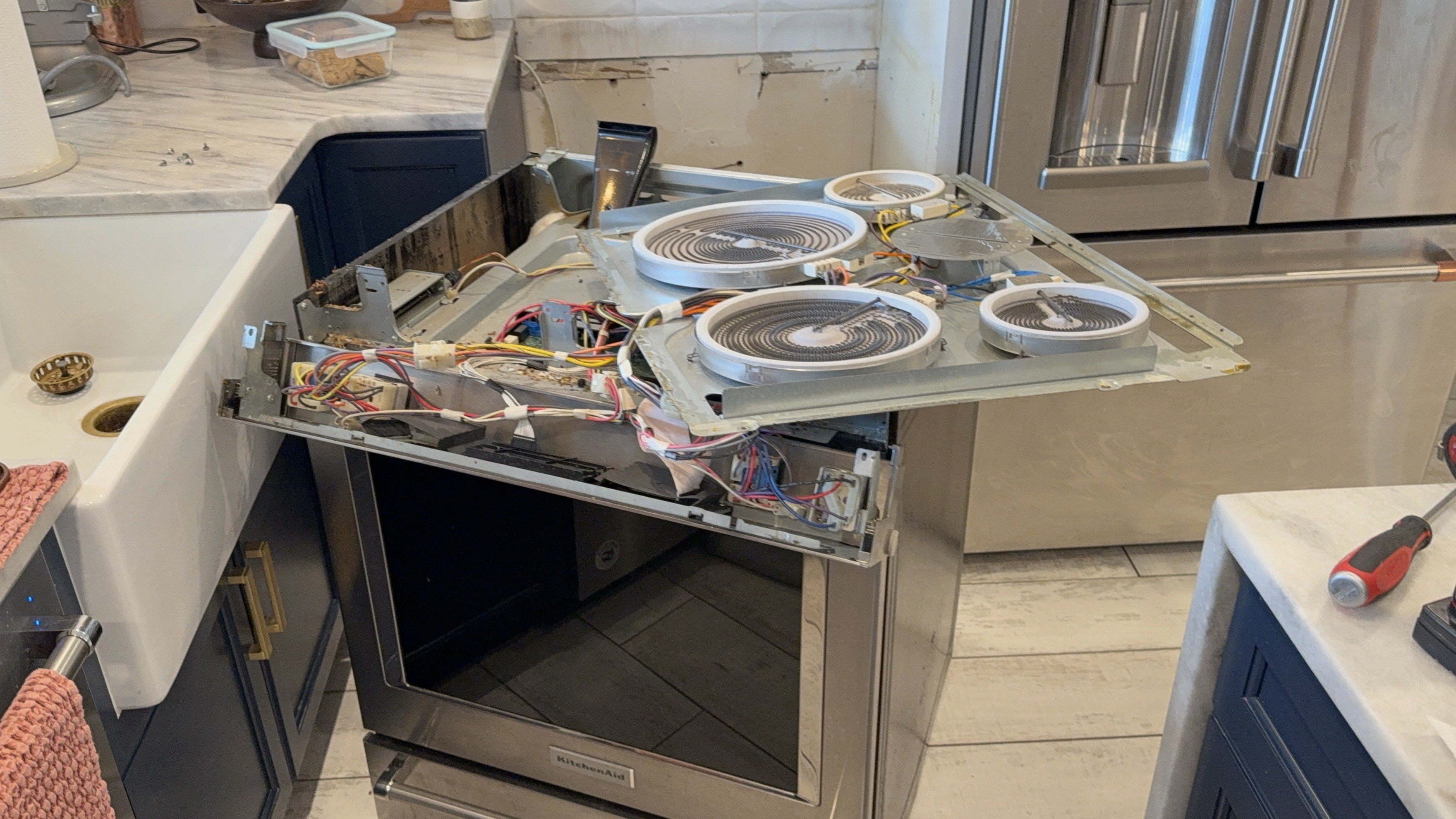 KitchenAid oven disassembled for repair near Tampa Bay