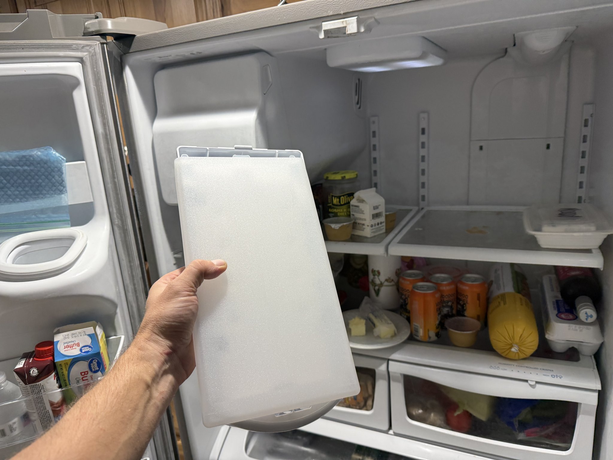 Whirlpool French door refrigerator evaporator panel removed during diagnostic — Palm Harbor FL repair call